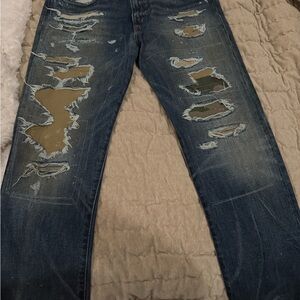 Woman’s Denim & Supply Distressed Blue Denim Jeans with Olive/Camo Patch Detail